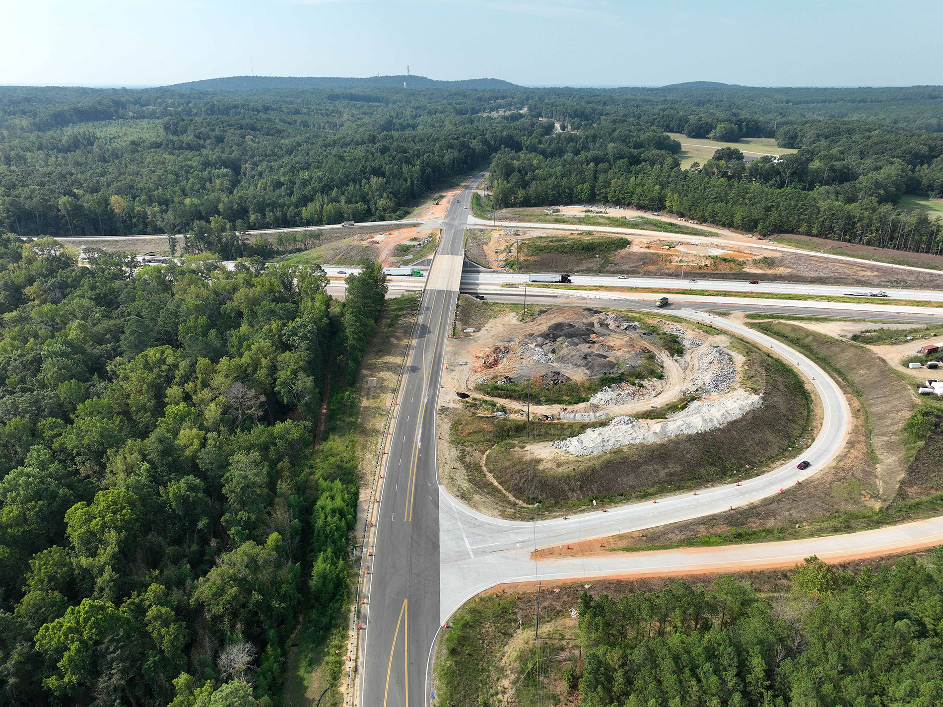 This photo shows the progress on the interchange at Exit 85 in Little Mountain. The new bridge and all four of the new ramp connections have been completed.