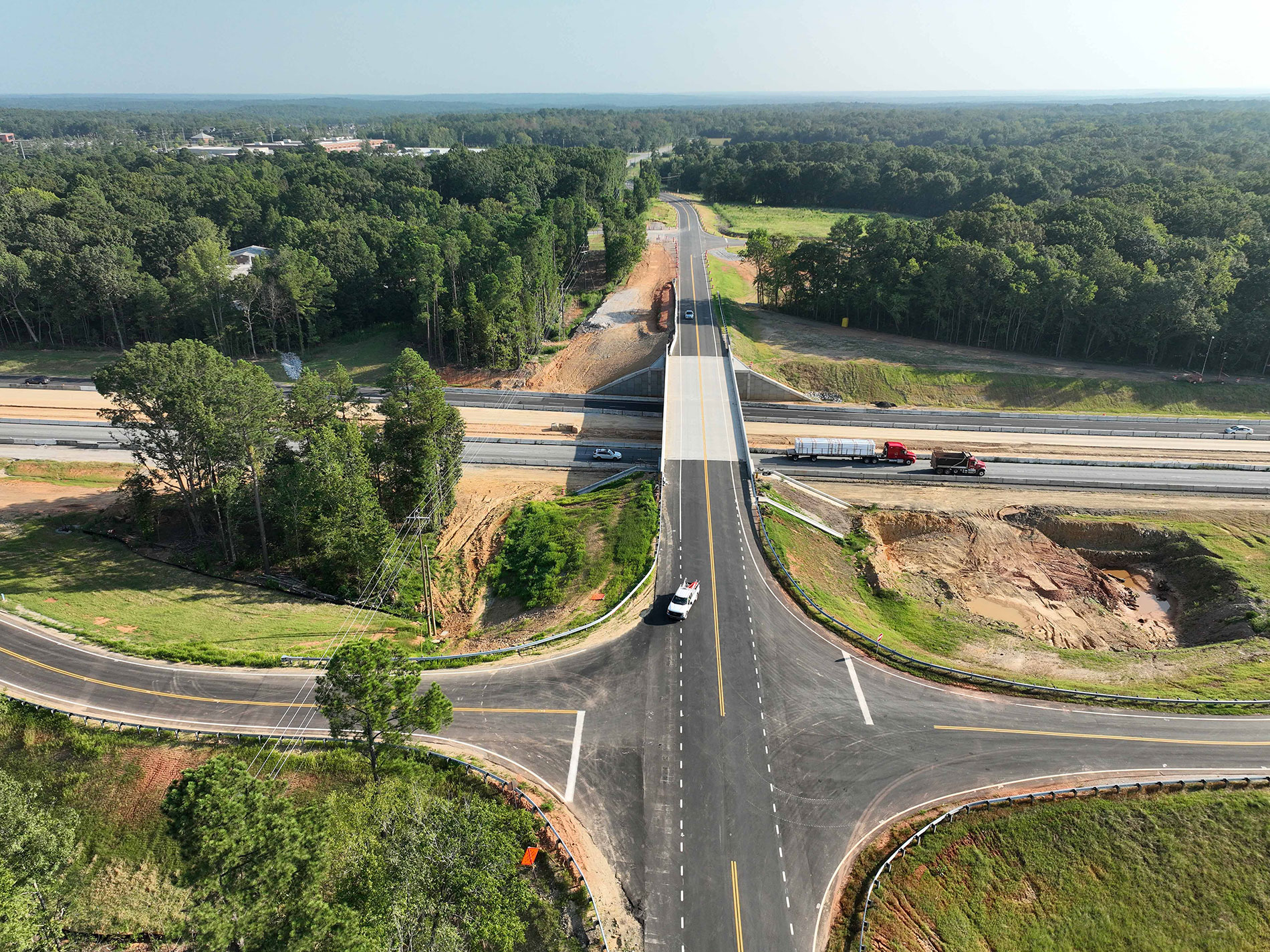 Work has been completed at the overpass bridge on Mount Vernon Road. This view shows the newly opened road and realigned side roads.